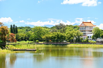 Fototapeta premium Hutoupi Reservoir in Tainan's Xinhua District is Taiwan's first reservoir, offering a rich blend of history, culture, and natural beauty with activities like lake strolling and boating.
