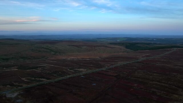 Sliabh Beagh, County Monaghan, Ireland, November 2022. Drone pulls west while ascending revealing the view towards Eshbrack Bog with Lough Antrawer and Lough Aportan in the distance.