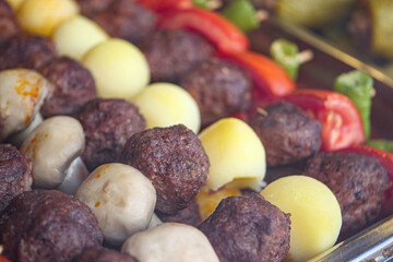 Enjoy Delicious Grilled Meatballs and Colorful Vegetable Skewers, ideal for picnics