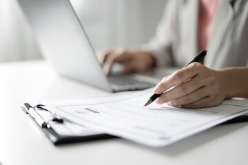 Business woman employer holding resume hiring recruit looking cv resume to hire candidates,...