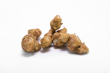kitchen spices or galangal or Kaempferia galanga on a white background