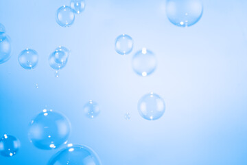 Beautiful Transparent Soap Bubbles Floating in The Air. Celebration Festive Backdrop. Freshness Soap Suds Bubbles Water. Abstract Blue Textured Background.	
