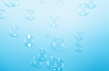 Beautiful Transparent Soap Bubbles Floating in The Air. Celebration Festive Backdrop. Freshness Soap Suds Bubbles Water. Abstract Blue Textured Background.	
