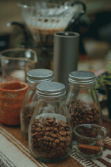 Male barista making coffee with manual dripper grinding beans. Coffee concept.