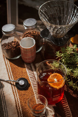 Male barista making coffee with manual dripper grinding beans. Coffee concept.