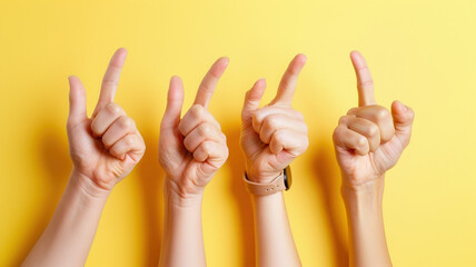 People crowd pointing index finger multiracial different hands of like sigh gesture symbol hands on studio yellow background. Approvement and satisfaction concept