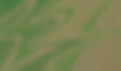 Grainy texture created by green and brown colors in abstract background