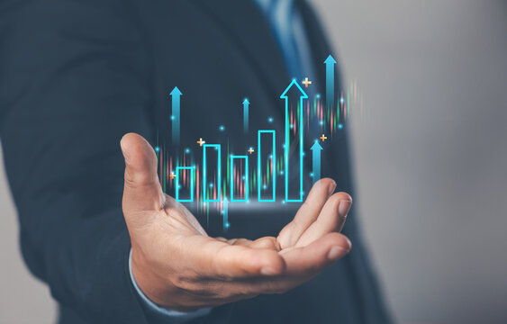Holding a digital marketing growth graph, analyzing business planning, and conducting financial research on the global network connection. business strategy and economic growth.