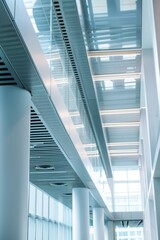 Obraz premium Modern office building interior with glass and steel design