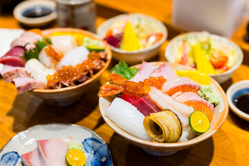 Assorted fresh sashimi fish rice bowl