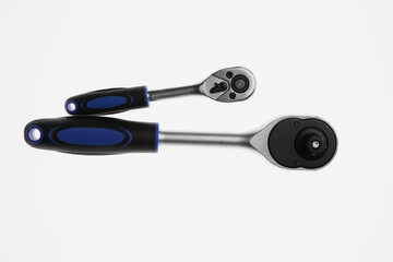 Two torque wrenches on white background, top view. Auto mechanic tools