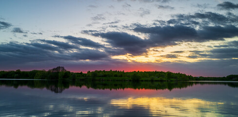 Fototapeta premium sunset over the lake, Treton