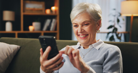 Home, smile and mature woman with cellphone, reading and online for game, subscription and click on...