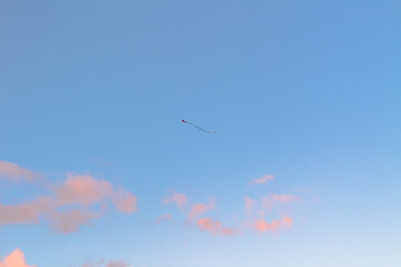 clouds forming in the bright blue sky