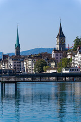 Fototapeta premium Scenic view of Limmat River at the old town of Swiss City of Zürich on a sunny summer day. Photo taken August 6th, 2024, Zurich, Switzerland.