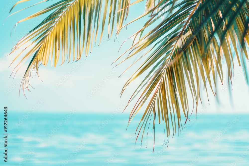 Poster A serene ocean view featuring a palm tree in the foreground, perfect for use as a calm background or to represent tropical destinations