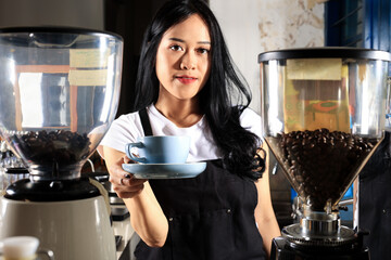 Female Barista Serving Coffee in Grey Cup, Small Coffee Shop Concept