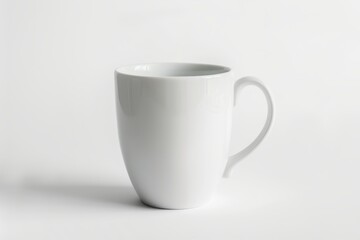 Fototapeta premium A White Ceramic Mug with a Handle