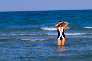Woman body beautiful with bikini relax on beach