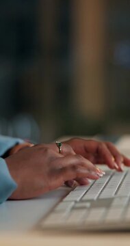 Typing, keyboard and hands of woman in office at night working on client investment risk report. Computer, reading and female actuary with deadline for stock market trading metrics with closeup
