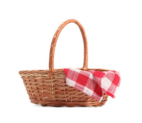 One picnic wicker basket with checkered napkin isolated on white