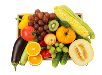 Different fresh fruits and vegetables in crate isolated on white, top view