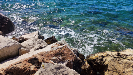 Adriatic sea surface with pebbles and stones 