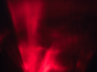 Red reflection in the dark for mysterious abstract background.        