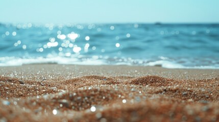 Close-up shot of a sandy beach near the ocean, suitable for travel or landscape use