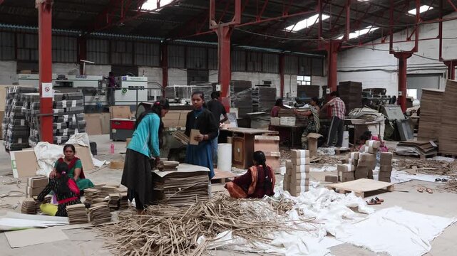 Bangalore, India 1st August 2024: Modern factory for the production of Corrugated Carton Boxes at a factory. warehouse storage, paper in the Products. Packaging Industry. Cartoning Solutions.