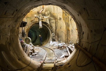 Underground tunnel infrastructure construction with engineer or technician control. Transport pipeline by Tunnel Boring machine.