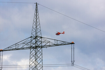 helicopter and a high voltage road
