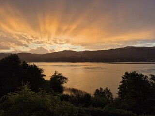 Sunset over an alpine lake 