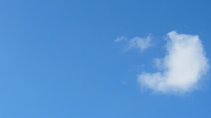 Blue sky background. sky and white clouds. warm weather.