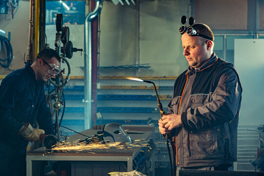 Handyman preparing autogenous welding tool