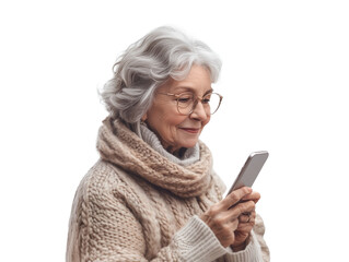 An elderly woman dressed in a warm, knitted sweater is enjoying her time indoors, engaged in using her smartphone. She appears delighted as she interacts with the device