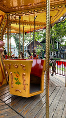 decorative carousel horse on a merry-go-round with intricate details. 
