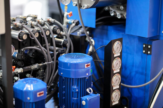 closeup of hydraulic and electrical equipment