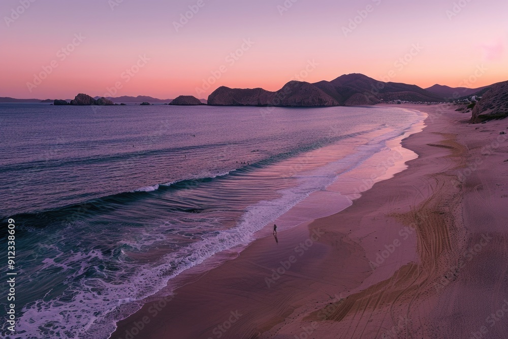 Poster a serene beach scene with waves rolling in at sunset
