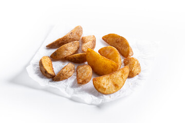 fried potato wedges isolated on white background