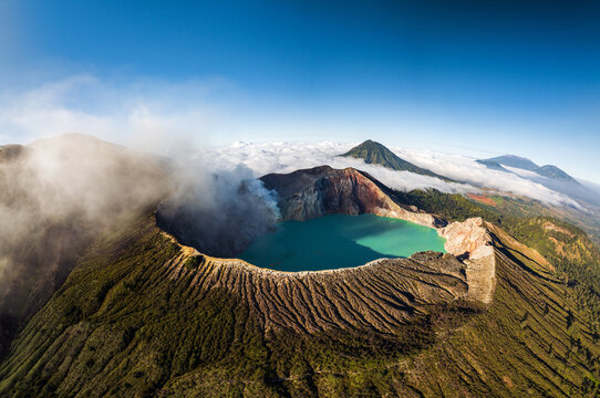 Aerial panorama drone view of mount Kawah Ijen volcano crater at sunrise, East Java, Indonesia