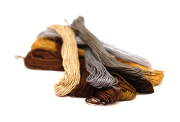 Cotton embroidery thread hanks in different colors, isolated on white background
