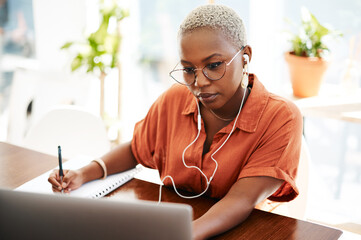 Reading, earphones and black woman at desk with laptop for assessment, contract or signature....