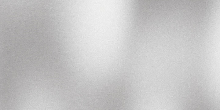 Abstract light silver background with grain texture reflecting light