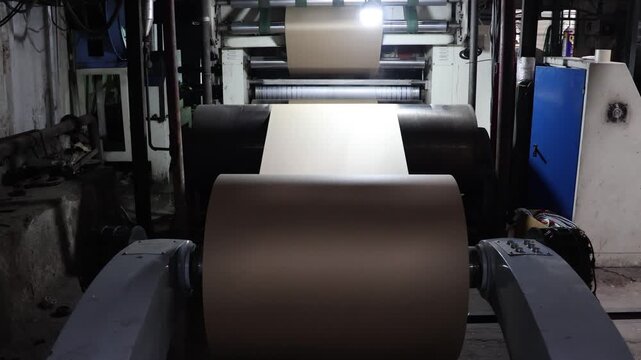 Bangalore, India 1st August 2024: Modern factory for the production of Corrugated Carton Boxes at a factory. warehouse storage, paper in the Products. Packaging Industry. Cartoning Solutions.