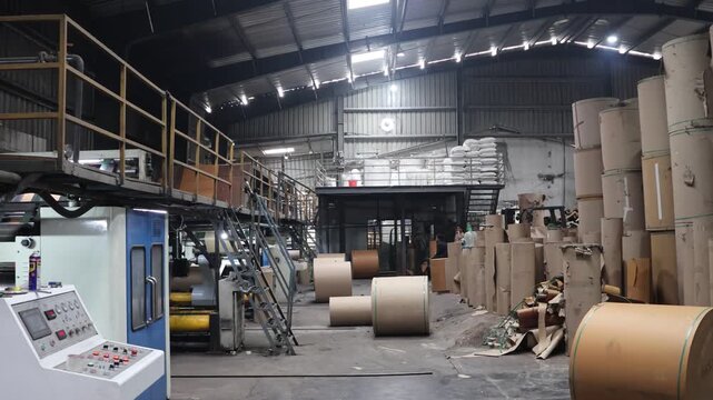 Bangalore, India 1st August 2024: Modern factory for the production of Corrugated Carton Boxes at a factory. warehouse storage, paper in the Products. Packaging Industry. Cartoning Solutions.