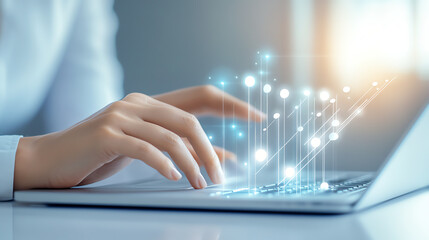 Close-up of a person typing on a laptop keyboard with glowing lines, representing technology, innovation, and digital communication.