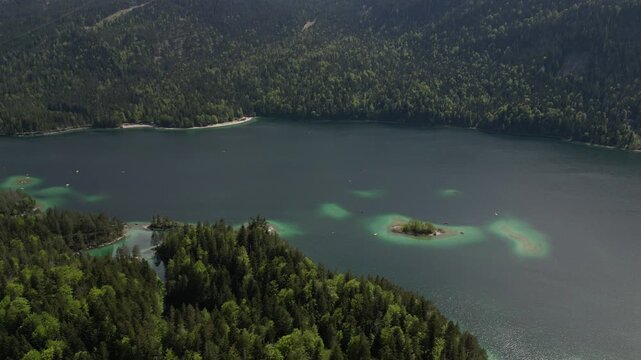 Eibsee Lake in Germany , crystal-clear waters, stunning alpine scenery, and a serene escape near the Zugspitze.