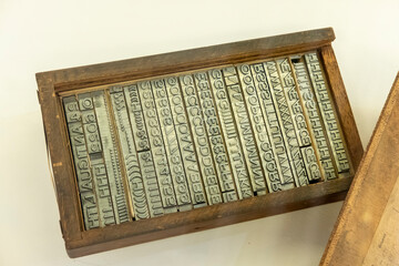 Letters to place and form words from an old printing press