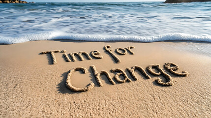 The phrase "Time for Change" written in beach sand, symbolizing the beginning of new opportunities and transformations.